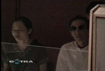 Catherine Cheng and Larry Gross on stage at Swami Satchidanda's speech in St. Peter's Church in New York City